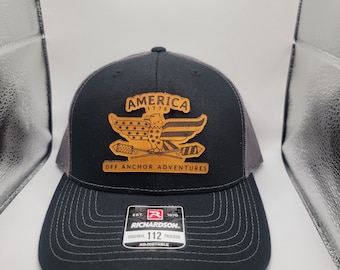 Richardson 112 trucker hat with a leather patch.  The leather patch is 4th of July theme 1776.