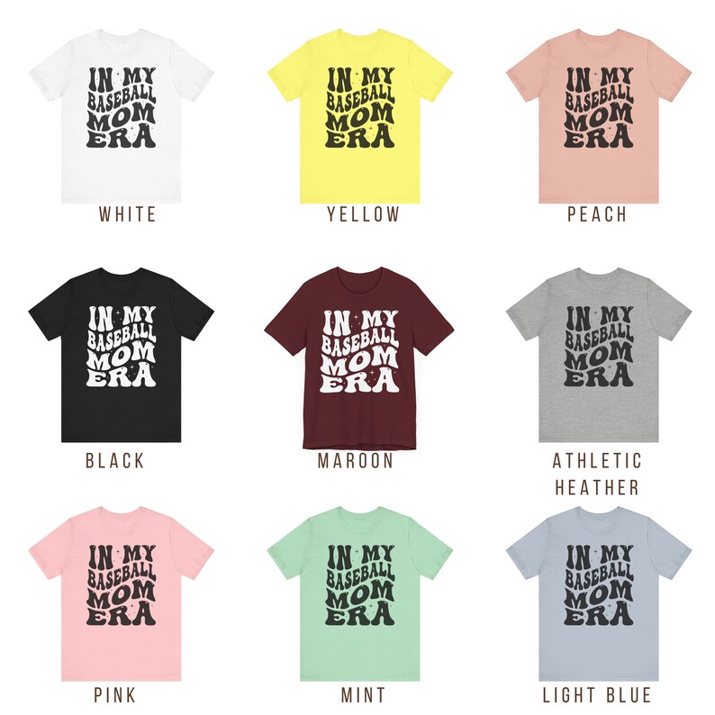 May include: Nine t-shirts in different colours featuring the text "In My Baseball Mom Era" in a retro font.