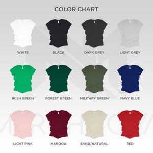 May include: A color chart displaying various t-shirt colors. The chart includes white, black, dark grey, light grey, Irish green, forest green, military green, navy blue, light pink, maroon, sand/natural, and red.