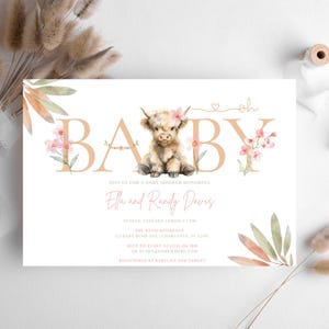 May include: A baby shower invitation with the word "BABY" in tan letters, featuring a watercolor illustration of a Highland cow with a floral crown. The invitation includes details for Ella and Randy Davis's baby shower.