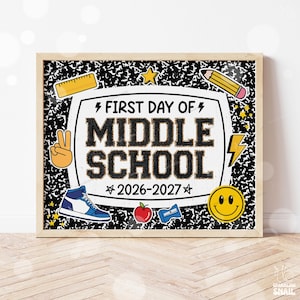 May include: A rectangular sign in a wooden frame featuring a black and white composition notebook pattern background. The center text reads FIRST DAY OF MIDDLE SCHOOL 2026-2027, surrounded by icons of a ruler, pencil, sneaker, apple, and smiley face.