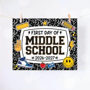 May include: A rectangular sign with a black and white composition notebook pattern featuring the text FIRST DAY OF MIDDLE SCHOOL 2026-2027. Illustrations include a yellow ruler, pencil, peace sign, lightning bolt, sneaker, apple, sharpener, and smiley face.