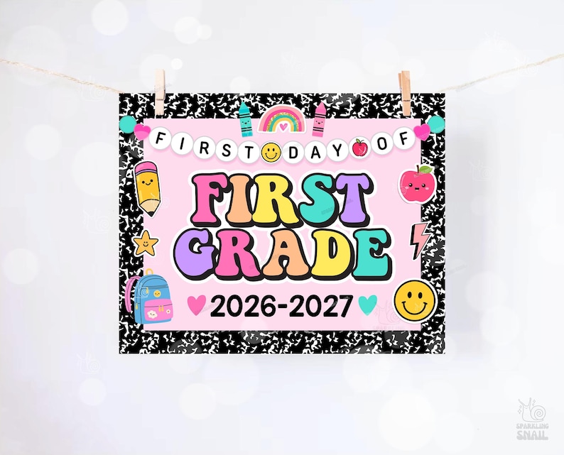 May include: A rectangular sign with a black and white composition notebook pattern border. The center is light pink with the text FIRST DAY OF FIRST GRADE 2026-2027. It features colorful illustrations of a pencil, rainbow, apple, backpack, and smiley face.