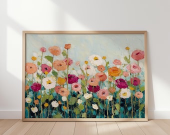 May include: A framed floral painting featuring a field of colorful flowers. The artwork showcases a variety of blooms in shades of pink, orange, white, and yellow against a light blue background. The painting is in a wooden frame.