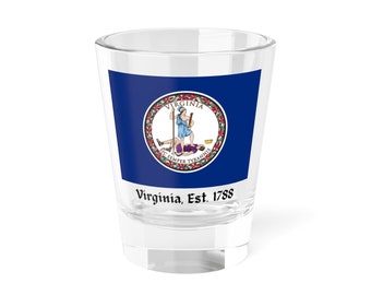 May include: A clear glass shot glass with the Virginia state flag printed on the front. The flag features a blue background with the state seal in the center. The seal depicts a woman standing on a tyrant, with the words "Sic Semper Tyrannis" written around the edge. The text "Virginia, Est. 1788" is printed below the flag.