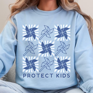 Child Abuse Prevention Awareness Month Sweatshirt With Pinwheel April We Wear Blue Sweater Protection Of Children Sweatshirt CPS Worker G322