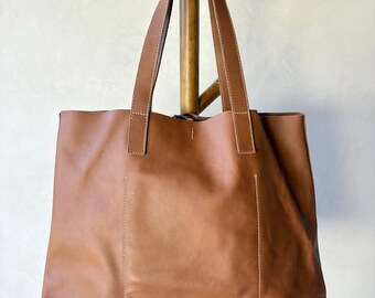 Handcrafted Artisanal leather tote/bag. Meticulously crafted.