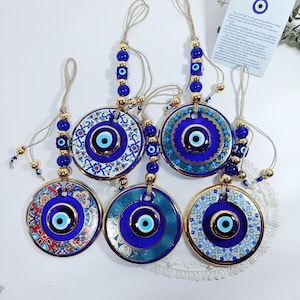 Evil Eye Wall Hanging 11cm. Turkish Nazar Charm,Decorated with Gold Edges and Patterns, Beautiful and Luxurious Blue Eye Protection Amulet