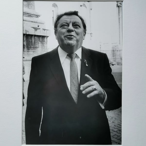 Franz Josef Strauß in Munich around 1970, original b/w gelatin silver print with original photo stamp from the photojournalist Alfred Strobel.