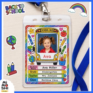 May include: A clear plastic ID badge holder with a blue lanyard featuring a school bus graphic, a photo of a child, and text including Ava Miller, Kindergarten, Mrs. Johnson, and Rainbow Class, surrounded by colorful school-themed illustrations.