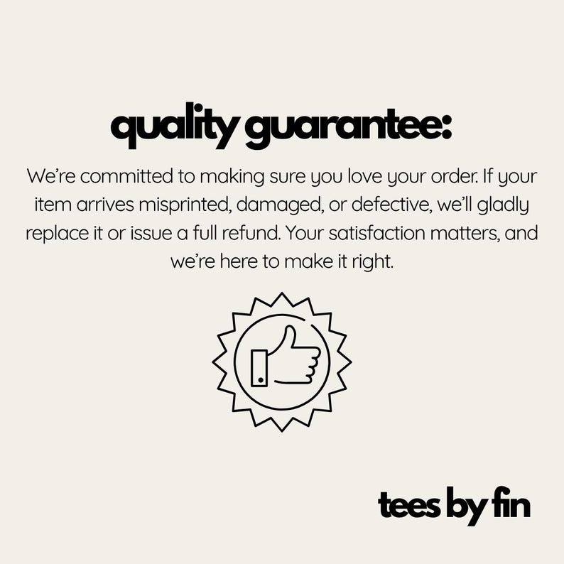 May include: Cream-colored graphic with the text "quality guarantee:" in black, followed by a guarantee statement. A thumbs-up icon is in a starburst shape. The brand name "tees by fin" is at the bottom.
