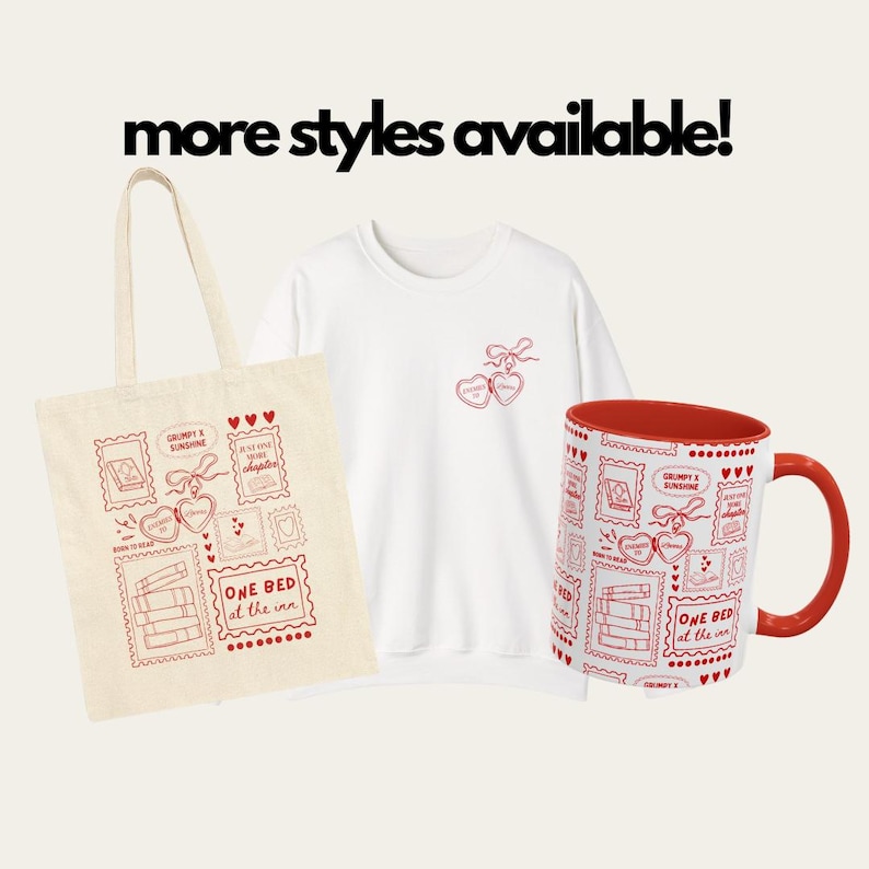 May include: A collection of merchandise featuring a red and white design. Includes a tote bag, a white sweatshirt, and a red-handled mug. The design features postage stamp-style illustrations with hearts, books, and the text "GRUMPY X SUNSHINE" and "ONE BED at the inn."