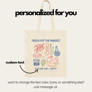 May include: Cream-colored tote bag with the text "personalized for you" at the top. The bag features a colorful illustration of groceries and the text "FRESH OFF THE MARKET" and "FUTURE MRS. SMITH".