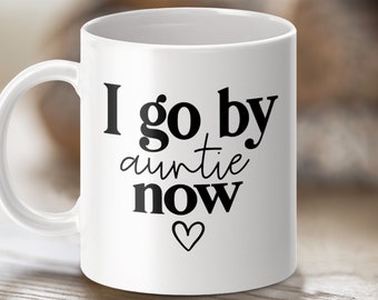 I go by auntie now mug, auntie gift, funny auntie mug, new auntie coffee mug, auntie announcement, proud auntie gift