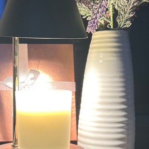 Radiate Sunshine-10 oz. Wickless Soy Candle to safely provide the ambiance and aroma of a candle all without the flame.