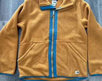 the North Face Men’s Size M jacket , new, full zipper, nice fall color brown/blue