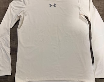 Camisetas blancas de manga larga para niñas de Under Armour para clima frío