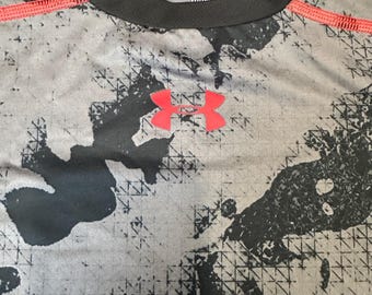 Camisetas deportivas de manga corta Under Armour para niños con protección térmica