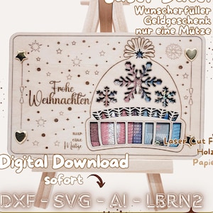 May include: A wooden laser-cut Christmas-themed design featuring a hat with a snowflake and star cutouts. The design includes the words "Frohe Weihnachten" and "Digital Download" with file format options. It is displayed on a small wooden easel.