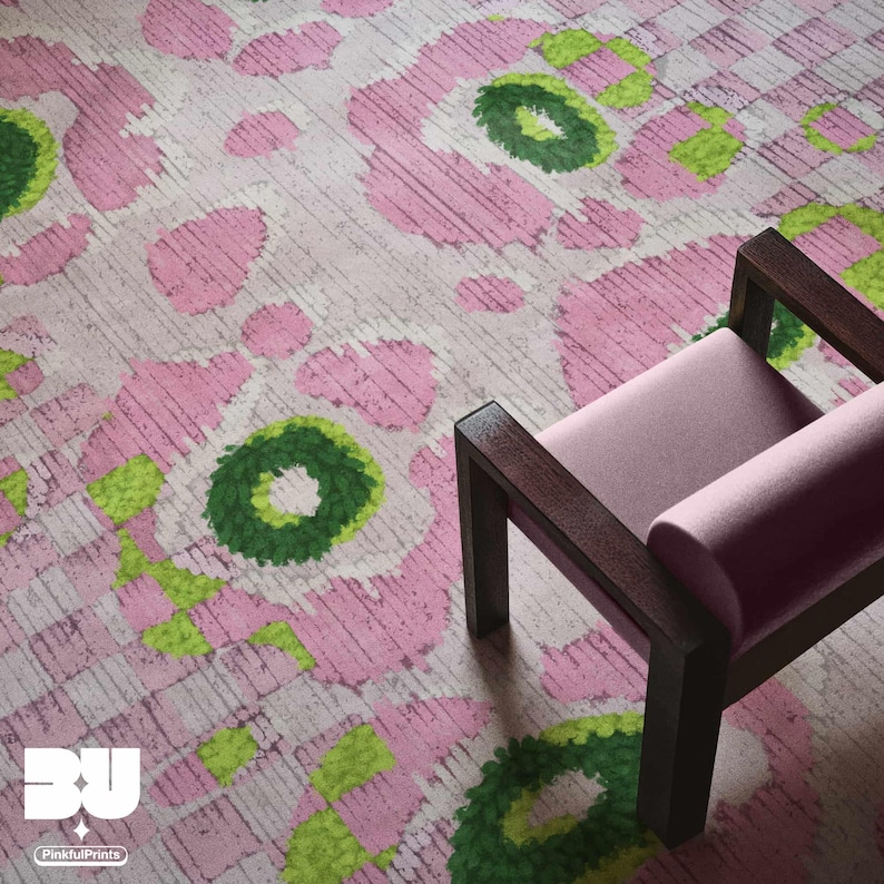 A muted pink chair with wooden armrests is placed on a vibrant aesthetic rug, colorful carpet with pastel pink flower floral pattern, abstract geometric leopard pattern and green checkered patterns.