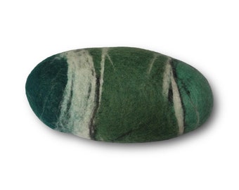 May include: A green and white felted stone with a smooth, oval shape. The stone is made of wool and has a natural, organic look.