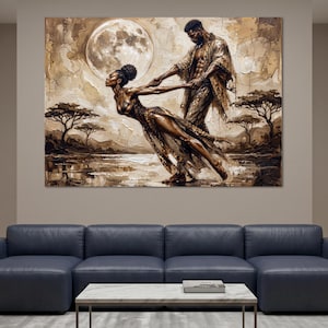 May include: A large rectangular wall art print featuring a sepia-toned painting of two figures dancing in a landscape with acacia trees and a large full moon. The artwork displays a textured, painterly style with brown, beige, and cream hues.