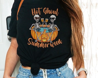 May include: Black t-shirt with the text "Hot Ghoul Summerween" and a graphic of two skeletons in a pumpkin hot tub. The shirt is paired with a denim skirt with a front zip.