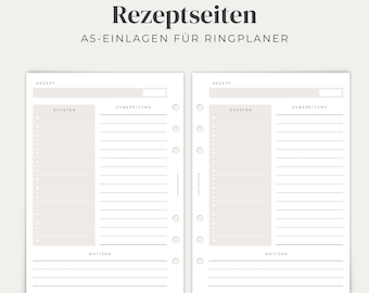 May include: Two white A5 planner inserts for recipes with the text "Rezeptseiten" and "A5-EINLAGEN FÜR RINGPLANER" at the top. Each page features sections for "REZEPT", "ZUTATEN", "ZUBEREITUNG", and "NOTIZEN" with lined spaces and six ring binder holes.