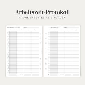 Könnte beinhalten: Zwei A5-Planereinlagen zur Zeiterfassung mit der Aufschrift Arbeitszeit-Protokoll und Stundenzettel. Jedes weiße Blatt enthält ein Raster mit Spalten für Gesamtzeit, Start, Ende und Pausen, nummeriert von 1 bis 31 für tägliche Einträge.