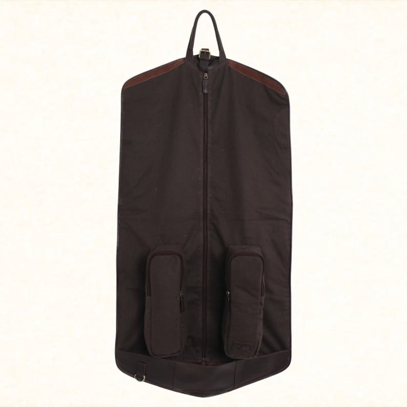 Handcrafted leather suit carrier, designed for travelers. A versatile garment bag for suits, weddings, and stylish gifts, made from premium leather for durability and elegance.