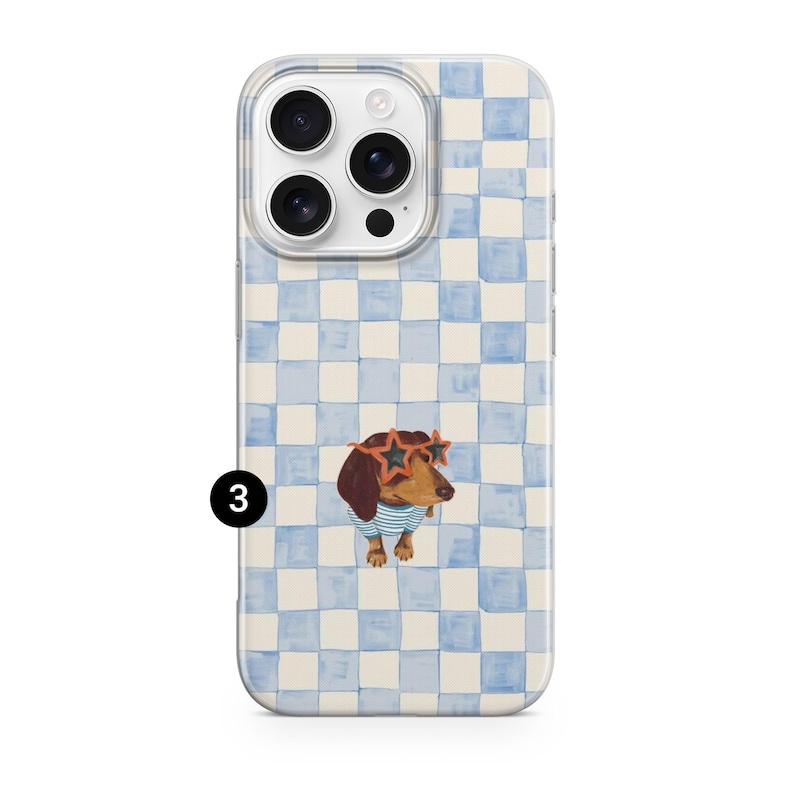 May include: A clear phone case with a blue and white checkered pattern. The case features a dachshund wearing star-shaped sunglasses and a blue and white striped shirt. The number 3 is printed in black on the bottom left.