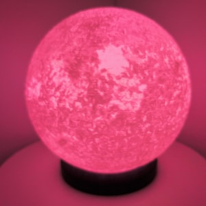 Sun multi color globe light.