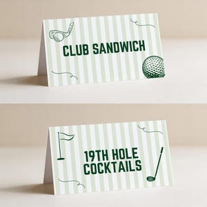 May include: Two folded paper tent cards with a light green and white vertical striped pattern. One card features a golf club, a golf ball, and the text CLUB SANDWICH. The other card displays a golf flag, a golf club, and the text 19TH HOLE COCKTAILS.