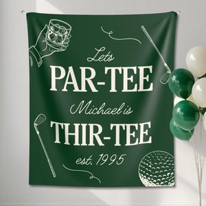 May include: A dark green banner with white text and illustrations. The banner reads "Lets PAR-TEE Michael is THIR-TEE est. 1995". Illustrations include a golf ball, golf clubs, and a hand holding a glass of whiskey.