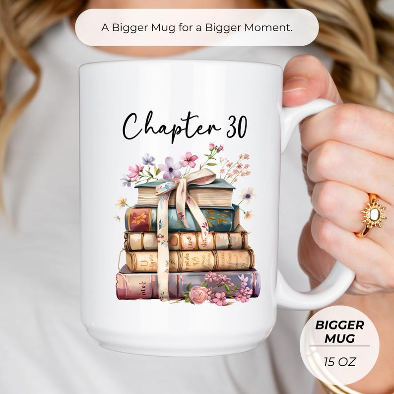 May include: White ceramic mug with the text "Chapter 30" and a stack of books decorated with flowers and a ribbon. The mug is labeled "BIGGER MUG" and is 15 oz.