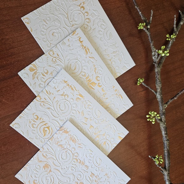 Handcrafted embossed and gilded notecard