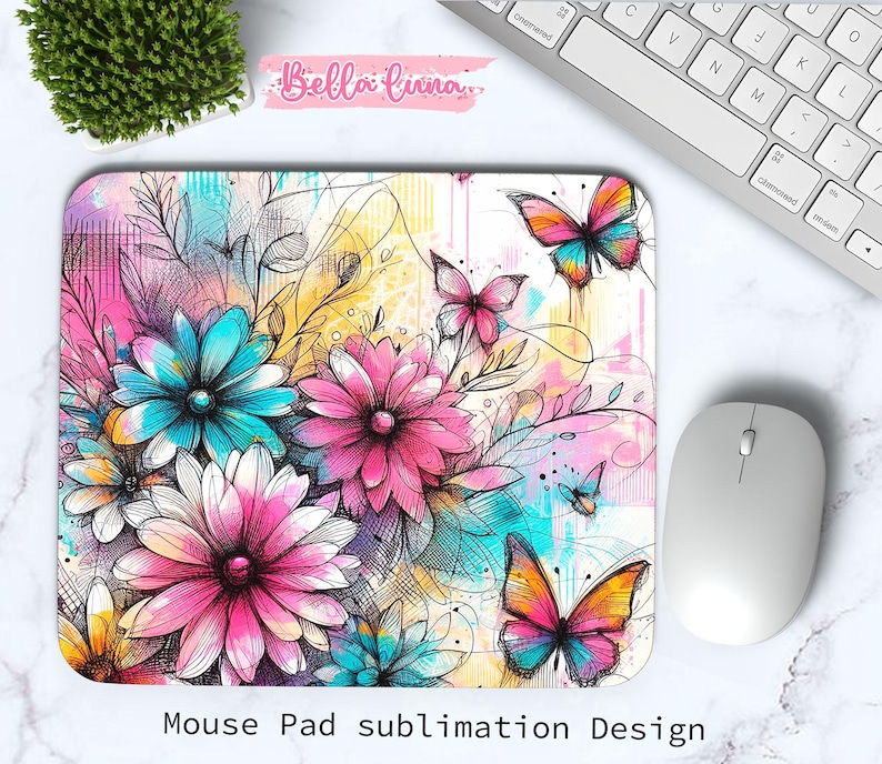 May include: A rectangular mouse pad featuring a floral and butterfly design. The design includes pink, blue, and yellow flowers, along with colorful butterflies. The text "Mouse Pad sublimation Design" is at the bottom.