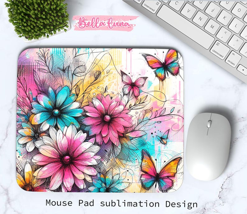 May include: A rectangular mouse pad featuring a floral and butterfly design. The pad has a white background with pink, blue, and yellow flowers and colorful butterflies. The text "Mouse Pad sublimation Design" is at the bottom.