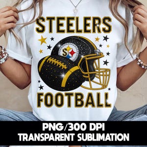 Show your Pittsburgh football pride with this bold black and gold design featuring a sparkling helmet and football. Perfect for game day fans who want a stylish sports T-shirt that stands out. Great for tailgates, playoffs, cheering, or gifting to any Pittsburgh supporter.