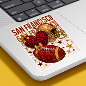 Create eye-catching merch with this San Francisco Football sticker design featuring a leopard coquette helmet heart and glam football details. Perfect for laptops, water bottles, planners, notebooks, and game day accessories, this design appeals to Football Moms, sports fans, and coquette style lovers looking for fun and trendy football stickers.