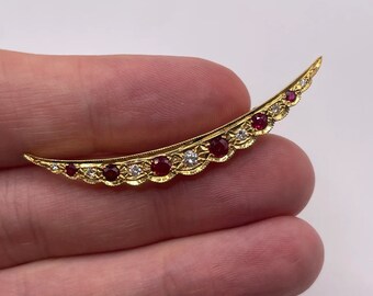 18ct gold ruby and diamond crescent brooch