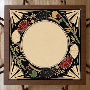 May include: A square wooden table featuring a central circular beige inlay surrounded by a black border decorated with red, cream, and black folding fans, green bamboo stalks, and small circles in red, green, and gold colors.