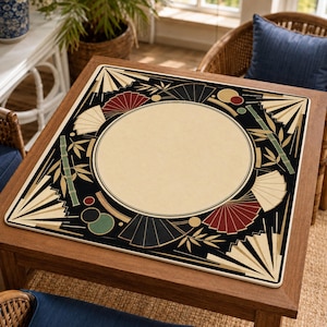 May include: A square game mat featuring a large central cream-colored circle surrounded by a black border. The design includes stylized folding fans in cream, red, and black, along with green bamboo stalks and small solid circles in red and green.
