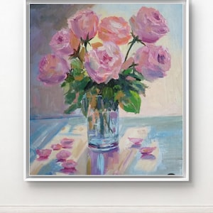May include: A painting of a bouquet of pink roses in a clear glass vase on a table. The roses are arranged in a loose, natural style, and the vase is simple and elegant. The background is a soft, muted color, and the light is coming from the left side of the painting.