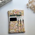 Floral Book Sleeve with Pockets: Handmade Cotton Book Protector and Journal Pouch product logo