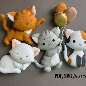 May include: A collection of handmade felt cat toys in various colors, including orange, white, gray, and calico. One cat holds balloons. The toys are designed with stitched details and smiling faces. The text "PDF, SVG pattern" is at the bottom.