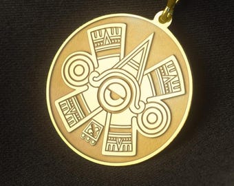 May include: Gold-colored pendant necklace featuring a circular pendant with an intricate Aztec design. The pendant is suspended from a delicate gold chain. The design includes geometric shapes and symbols, with a central eye-like feature.