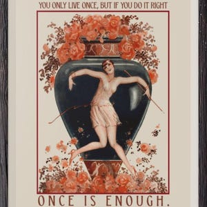 May include: Framed vintage art print featuring a woman dancing in a pink dress, set against a dark blue vase overflowing with orange roses. The print includes the quote "YOU ONLY LIVE ONCE, BUT IF YOU DO IT RIGHT ONCE IS ENOUGH. MAE WEST."