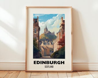 May include: Framed art print featuring a watercolor illustration of Edinburgh, Scotland. The artwork depicts a street scene with buildings and a castle on a hill under a blue sky. The text "EDINBURGH SCOTLAND" is displayed at the bottom.