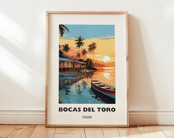 May include: Framed art print featuring a tropical scene of Bocas del Toro, Panama. The artwork depicts a sunset over calm water with boats, palm trees, and buildings. The text "Bocas del Toro, Panama" is at the bottom.